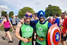 Mark Miller, right, with friend Simon Aellan, ran the Great South Run in support of Portsmouth Down Syndrome Association. Picture: David George