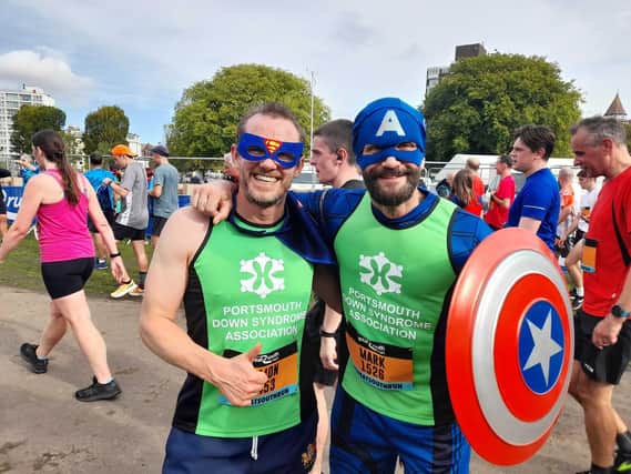 Mark Miller, right, with friend Simon Aellan, ran the Great South Run in support of Portsmouth Down Syndrome Association. Picture: David George