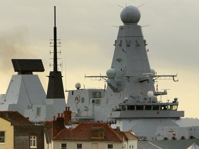 The Royal Navy's newest warship, HMS Dauntless, enters her home port of Portsmouth for the first time. Wednesday December 2, 2009. The Type 45 destroyer was launched in January 2007 from its Govan shipyard in Glasgow and since then has been carrying out sea trials in Scottish waters. She will be handed over from the builders BAE Systems in a ceremony at the naval dockyard tomorrow. See PA story DEFENCE Dauntless. Photo credit should read: Chris Ison/PA Wire