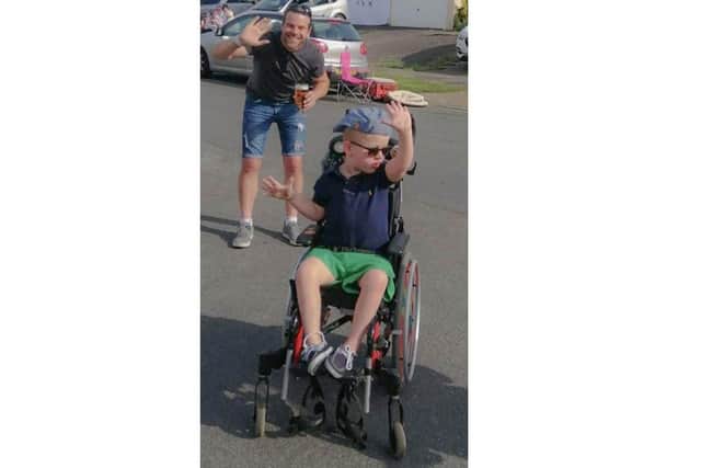 Mark Harris from Purbrook held his second gig on his roof to raise money for Chestnut Tree House children's hospice, inspired by 8-year-old Jack Woods who has Lowe syndrome