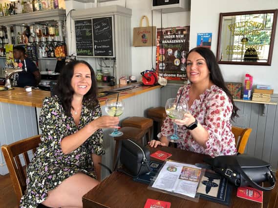 Chloe Eggleton and Keighley Holden enjoy some lunchtime drinks at the Fifth Hants Volunteer Arms in Albert Road. 


Picture: Richard Lemmer