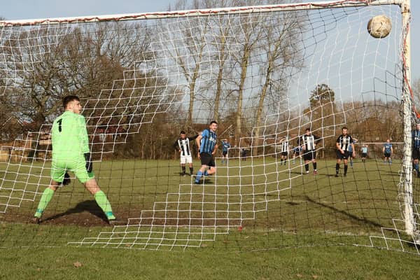 Coach & Horses' Tommy Tierney converts a penalty against Emsworth. Picture by Kevin Shipp