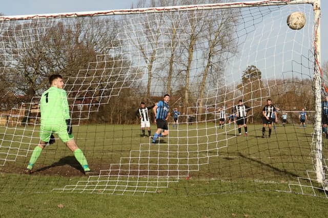 Coach & Horses' Tommy Tierney converts a penalty against Emsworth. Picture by Kevin Shipp
