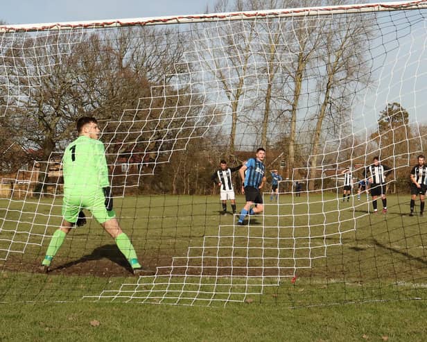 Coach & Horses' Tommy Tierney converts a penalty against Emsworth. Picture by Kevin Shipp