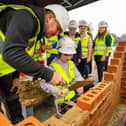 Students were shown how to lay bricks at Bellway’s Elizabeth Square development in Worthing