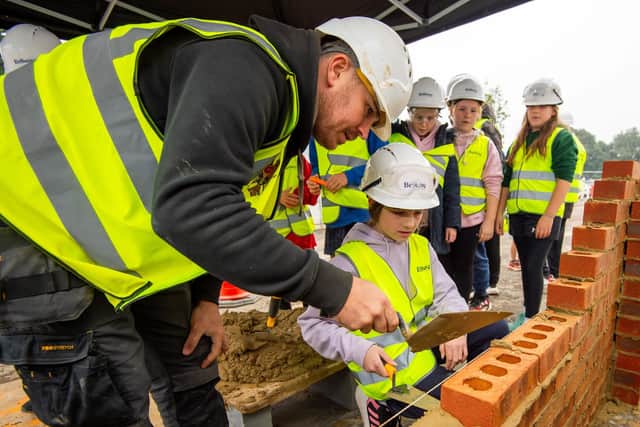 Students were shown how to lay bricks at Bellway’s Elizabeth Square development in Worthing