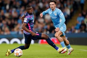 Manchester City's Jack Grealish (right) in action with RB Leipzig's Nordi Mukiele during the UEFA Champions League, Group A match at the Etihad Stadium, Manchester.