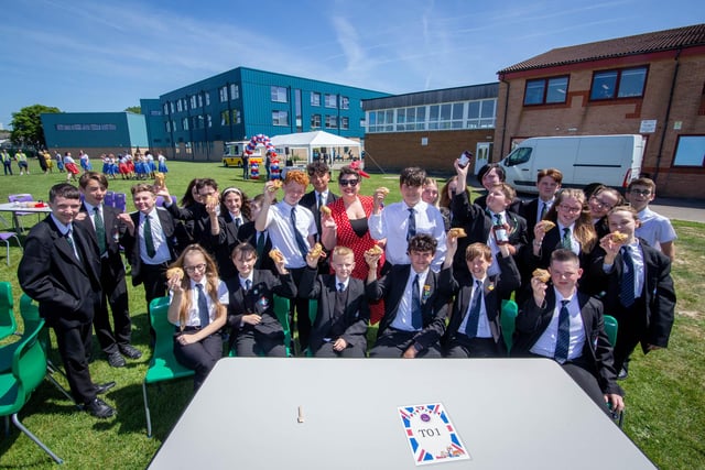 Pupils of Trafalgar School, Hilsea, Portsmouth celebrating with scones and jam
