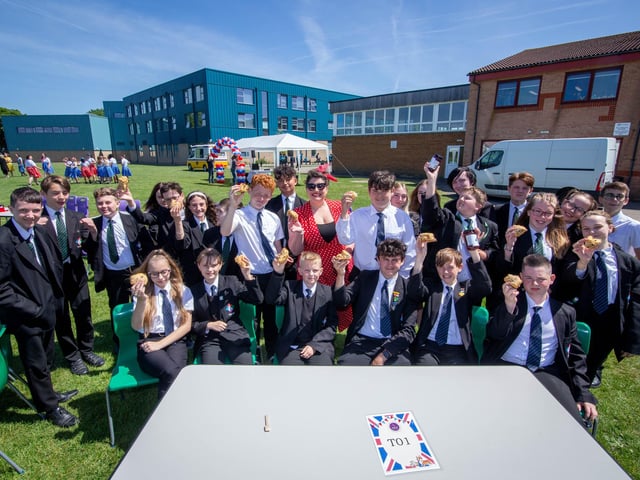 Pupils of Trafalgar School, Hilsea, Portsmouth celebrating with scones and jam