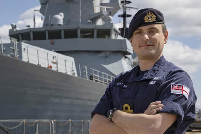 Portrait of Lt Cdr Will Durbin of HMS DuncanAwarded the Queen’s Commendation for Valuable Service in the Operational Honours, Lt Cdr Will Durbin poses today 12/05/22 on the North Jetty at HMNB Ports in front of HMS Duncan for his official portrait.Lt Cdr Durbin is to receive the award for his efforts in planning the aerial evacuation of civilians from Afghanistan during Op Pitting during the summer of 2021. Around 15,000 people were evacuated on around 100 flights over a 14-day period.