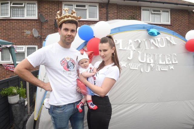 Residents in Dampier Close, Gosport, held a street party on Sunday, June 5, to celebrate The Queen's Platinum Jubilee.
Pictured is: Nathan Fall (36) with his partner Rachel Martin (39) and their daughter Elsie Fall (3 months old).
Picture: Sarah Standing (050622-9543)