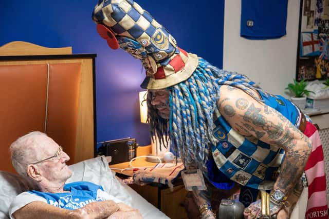 John Portsmouth Football Club Westwood on a visit to meet resident Wally James, a lifelong fan of the club, at Bluewater care home. Picture: Emma Terracciano.