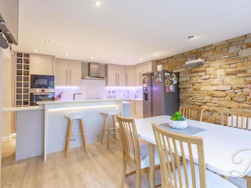 Breakfast or dinner can be enjoyed in the kitchen/diner. The room also features under-cupboard lighting.