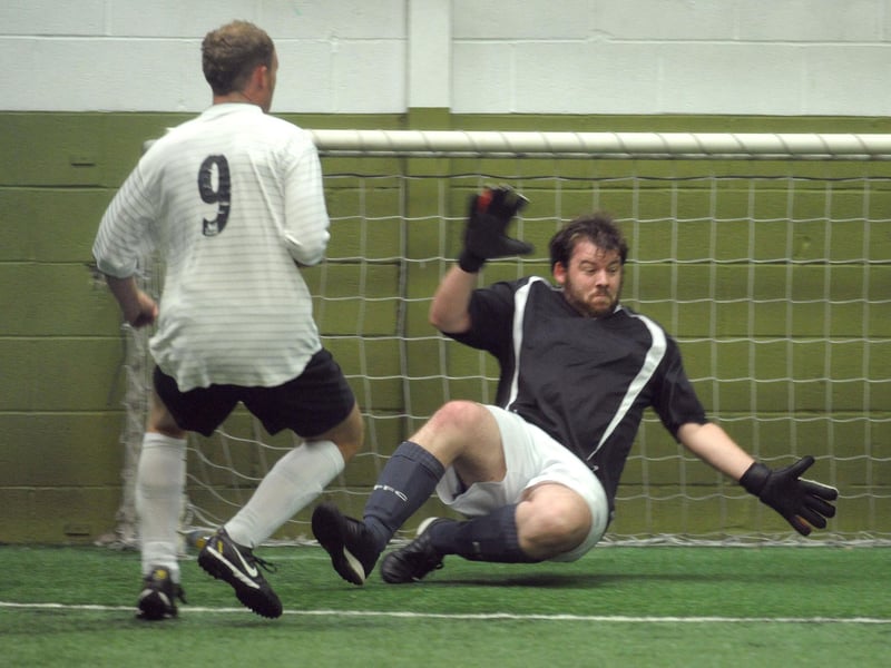 Hack Attack score a goal against Shirt Potatoes in 2009.