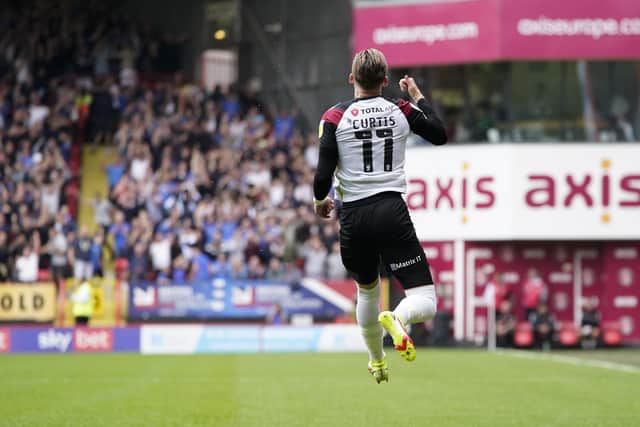 Ronan Curtis believes Pompey can still be pushing for promotion places despite of a seven game winless run photograph:Jason Brown/ProSportsImages