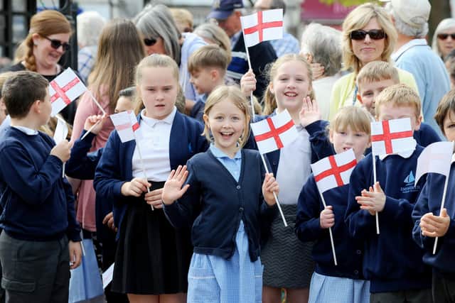 The annual St George's Day parade in Emsworth in 2019. Pictured is: (middle) Emily Matthews (8) from Emsworth Primary School.

Picture: Sarah Standing (230419-5637)