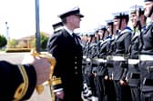 Rear Admiral Jim Higham OBE inspects the Guard of Honour at HMS Sultan.