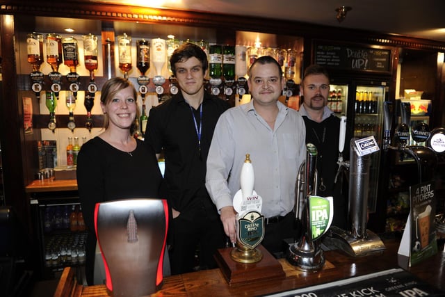 The Bar staff at The White Hart public house in Gosport in 2012 - from left, Sarah Sloane, Paddy Basson, landlord Ben Kevern, and Daniel Hathaway (123762-1)