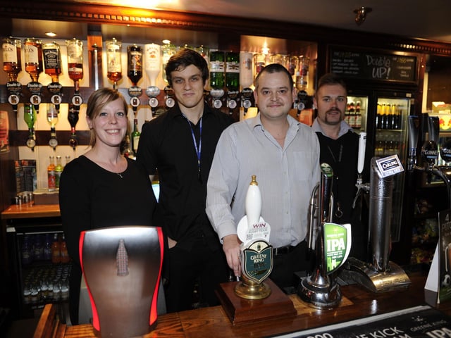 The Bar staff at The White Hart public house in Gosport in 2012 - from left, Sarah Sloane, Paddy Basson, landlord Ben Kevern, and Daniel Hathaway (123762-1)