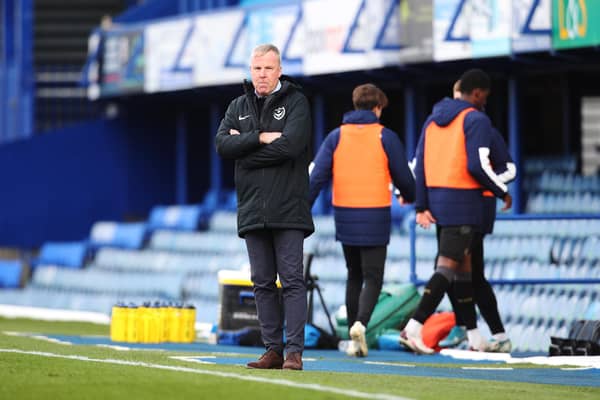 Kenny Jackett watches as Pompey suffered a 2-1 loss to Wigan - their first Fratton Park league defeat for almost months. Picture: Joe Pepler