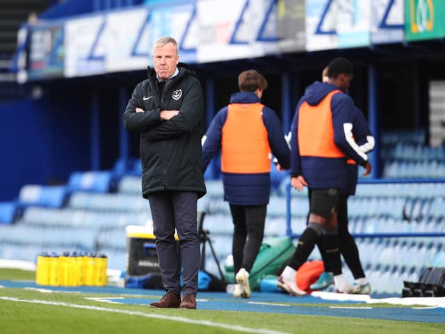 Kenny Jackett watches as Pompey suffered a 2-1 loss to Wigan - their first Fratton Park league defeat for almost months. Picture: Joe Pepler