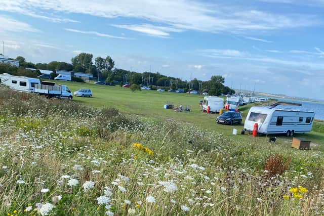 Travellers pictured at Milton Common on Thursday evening.