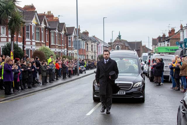 Winter Road/Wimborne Road lollipop man Tom James, who recently passed away, will be honoured by pupils and residents in the areaPictured: Hearse carrying Tom James on Winter Road, Portsmouth on Friday 11th March 2022Picture: Habibur Rahman