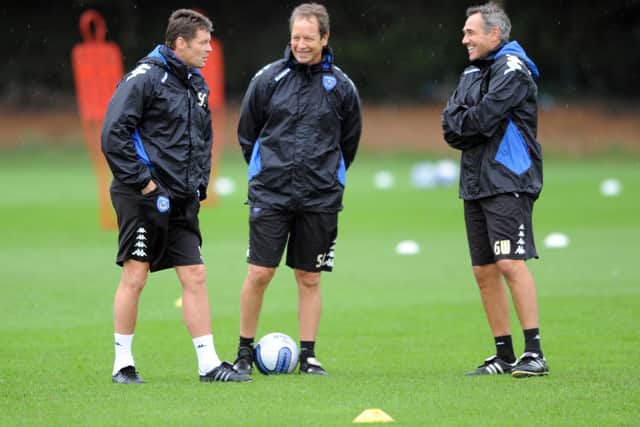 Steve Cotterill shares a joke with assistant manager Stuart Gray and coach Guy Whittingham during a Pompey training session in August 2011. Picture: Michael Jones/The Digital South