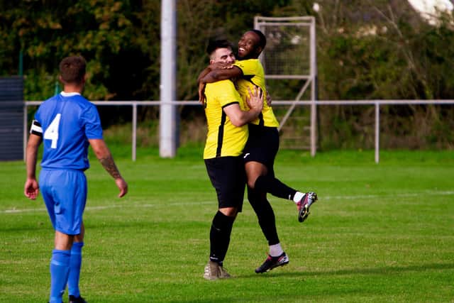 Junior Kamara, right, celebrates scoring his first Infinity goal with fellow sub Josh Carey against Liss. Pic: Kevin Steele.