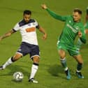 Billy Clifford, left, in action during Hawks' 2-1 win against Oxford City - one of only five National League South games the club have played in 2020/21 so far. Picture by Dave Haines.
