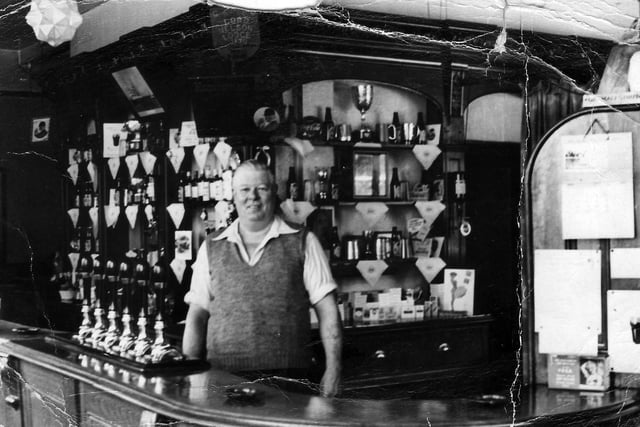 Ernest Diment behind the bar of The Nelson Tavern, Unicorn Road, Portsmouth