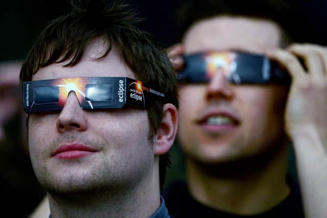 Members of the public are advised to use protective glasses to look into the sky at a partial solar eclipse (Photo by Jeff J Mitchell/Getty Images)