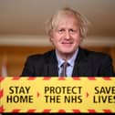 Prime Minister Boris Johnson  during a televised press conference at 10 Downing Street on February 22, 2021 in London, England. Photo by Leon Neal - WPA Pool/Getty Images