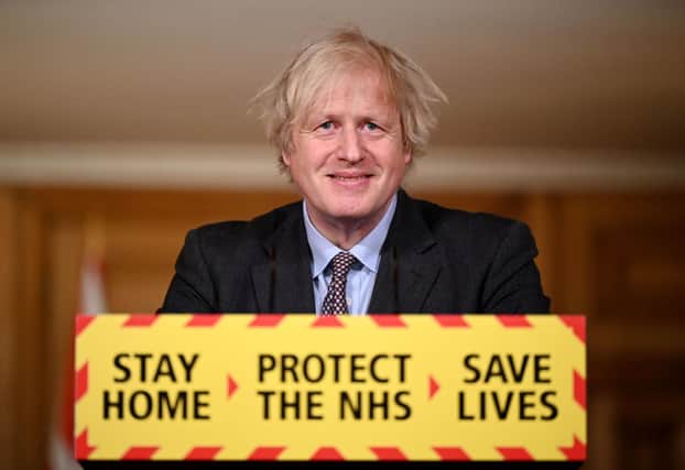 Prime Minister Boris Johnson during a televised press conference at 10 Downing Street on February 22, 2021 in London, England. Photo by Leon Neal - WPA Pool/Getty Images