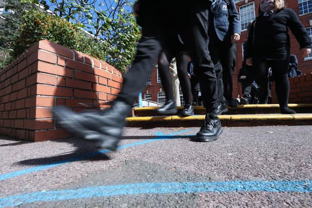 Priory School pupils follow the line which marks the one way system around the school. 

Picture: Chris Moorhouse