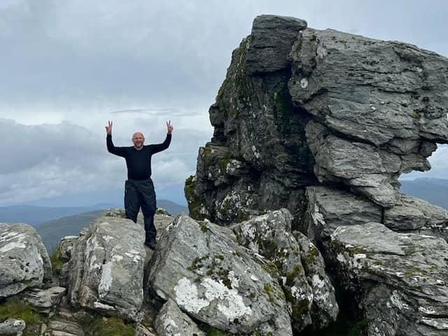 Matt Wilkie is trekking up six Scottish hills to raise money for R;pple. 
Pictured: Matt at the top of The Cobbler, Scotland, in a test run before the real trek.