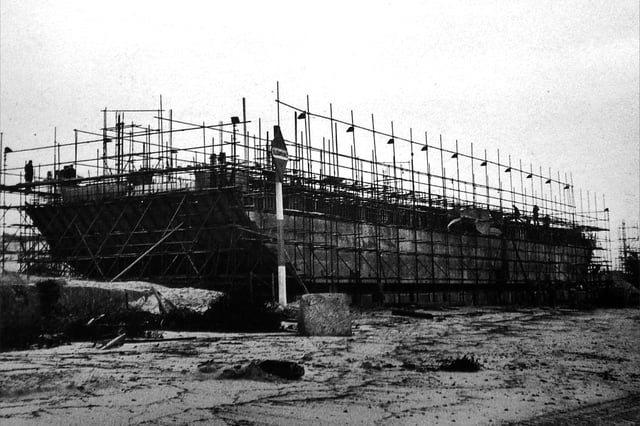A Mulberry Harbour section under construction. One still remains in Langstone Harbour. Picture: Mike Beel collection.