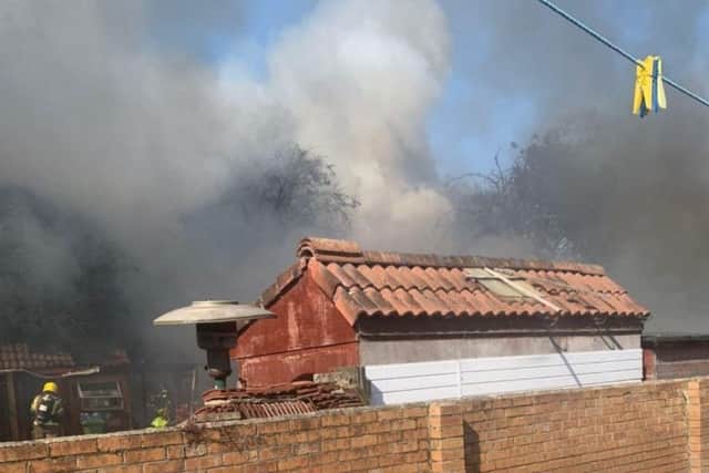 Smoke filled the sky as firefighters battled a back garden blaze in Woodlands Way, Havant, earlier this morning (June 22). Picture: HIWFRS.