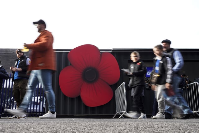 Fans were greeted by giant Poppies on their return to Fratton Park as the Blues marked Armistice Day.