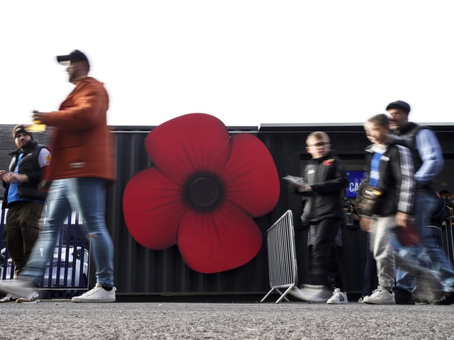 Fans were greeted by giant Poppies on their return to Fratton Park as the Blues marked Armistice Day.