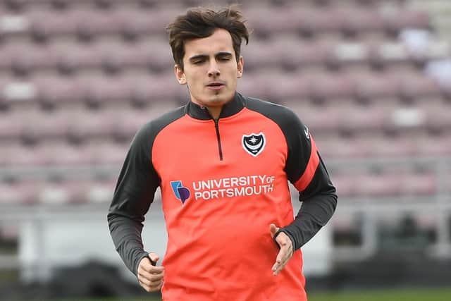 Harry Kavanagh warms up when serving as 19th man for Pompey. Picture: Dennis Goodwin