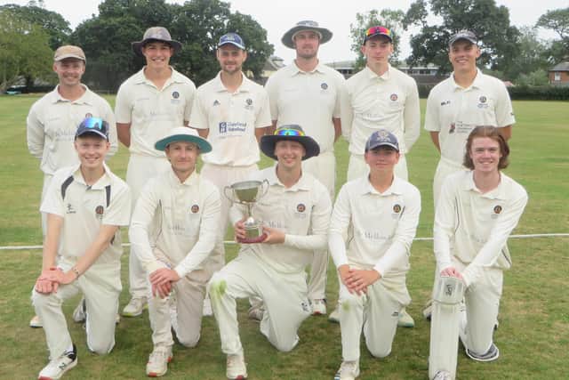 Hambledon skipper Spencer Le Clercq with the SPL Division 2 silverware