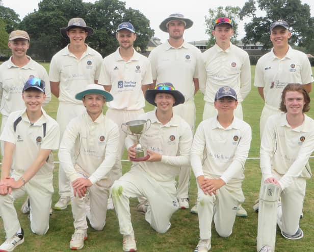 Hambledon skipper Spencer Le Clercq with the SPL Division 2 silverware