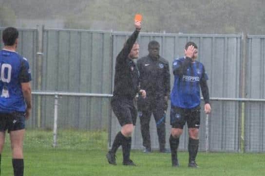 Clanfield midfielder Mike McCormack is sent off for a foul on Moneyfields' Jake Knight. Picture: Dan (JMA Media).
