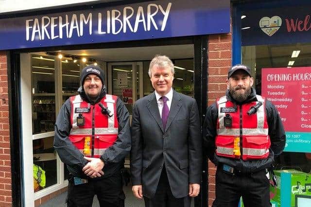 Council leader Sean Woodward with the two security officers patrolling Fareham town center earlier this year.