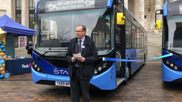 Marc Reddy, MD of First Hampshire, Dorset and Berkshire, with 7 and 8 Star buses in Guildhall Square, Portsmouth. Picture: David George