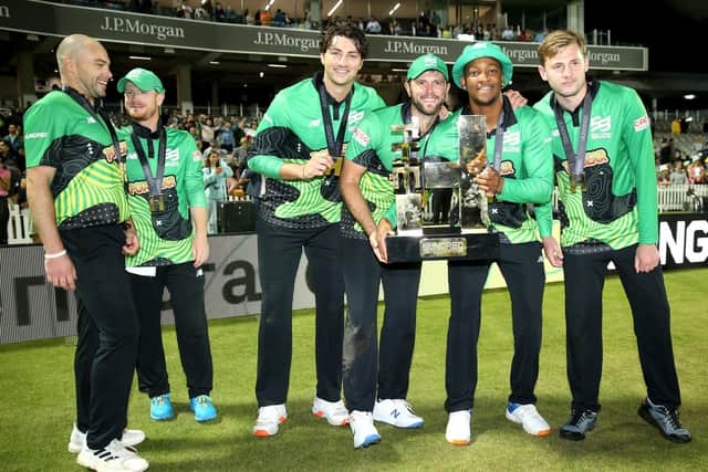 Southern Brave players lift the inaugural Hundred trophy. Picture by Steven Paston/PA Wire.