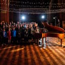 Shooting the video for St Lundi's Alone Over Christmas at Quay West Studios in Gosport with members of Hayling Youngstars and The Vox community choirs. Picture by Will Kenney