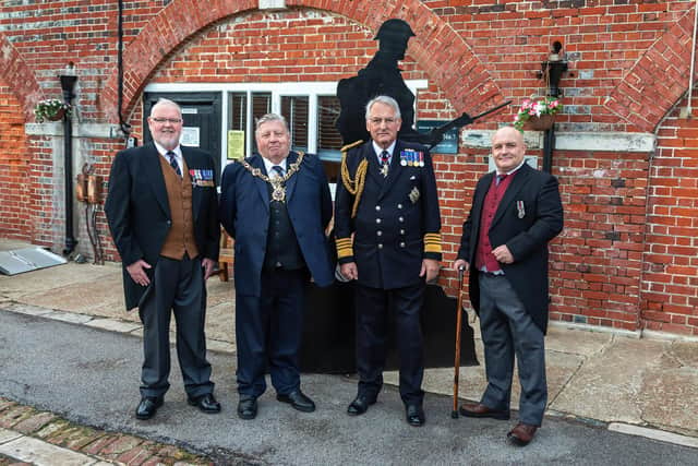 Award winner Anthony Knight with Councillor Frank Jonas (Lord Mayor of Portsmouth), Admiral Sir Jonathon Band (former First Sea Lord) and fellow award winner Gary Weaving (Founder and CEO of Forgotten Veterans). Picture: Mike Cooter (011221)
