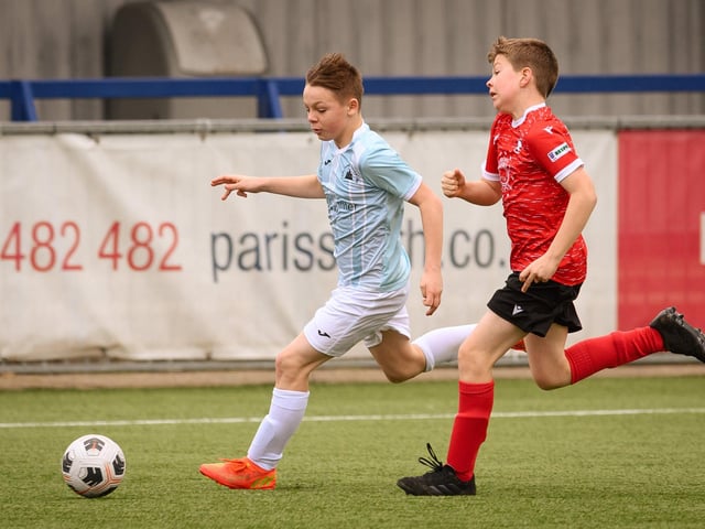 Action from the Portsmouth Youth League Geldard Invitation Cup final between Jubilee 77 U13s and Castle United U13s (light blue and white kit). Picture: Keith Woodland (190321-521)
